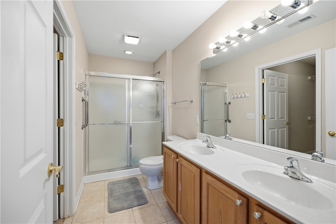 161 Life Style Lane Anderson, SC 29621 - Photo 18 of 22 This functional bathroom features a dual vanity and a shower for everyday convenience.