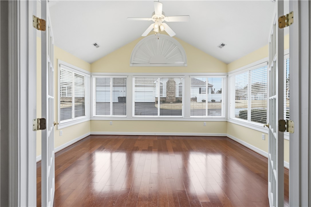 161 Life Style Lane Anderson, SC 29621 - Photo 6 of 22 This bright sunroom offers warm wood flooring and ample natural light through numerous windows.
