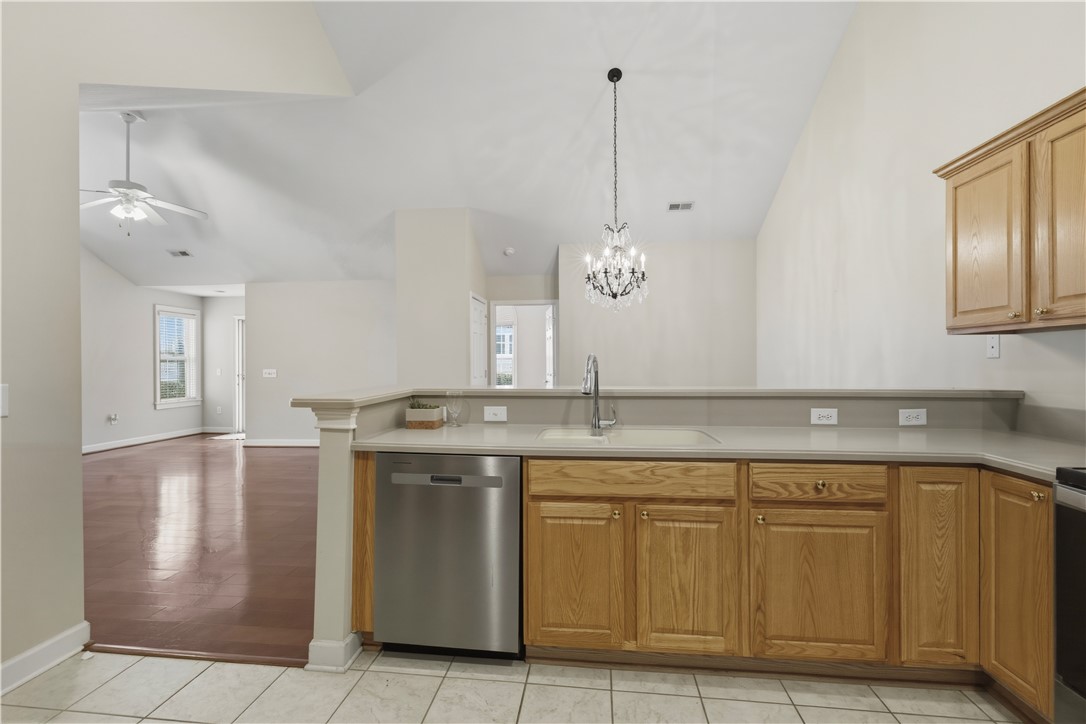 161 Life Style Lane Anderson, SC 29621 - Photo 9 of 22 This open-concept kitchen features bright cabinetry and modern appliances, creating a welcoming and functional space.