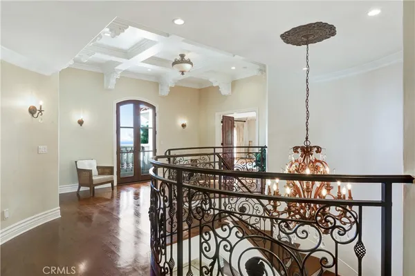 a living room with fireplace furniture and a flat screen tv
