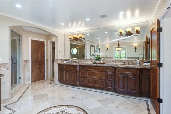 a kitchen with a sink and a stove