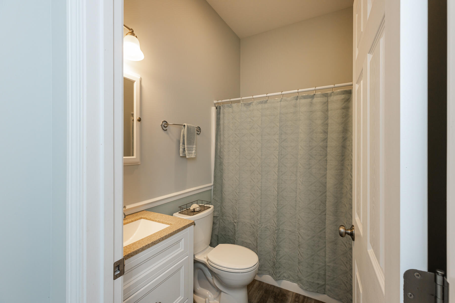 5 Whiffletree Circle Sandwich, MA 02563 - Photo 16 of 33 a bathroom with a granite countertop white toilet and a shower