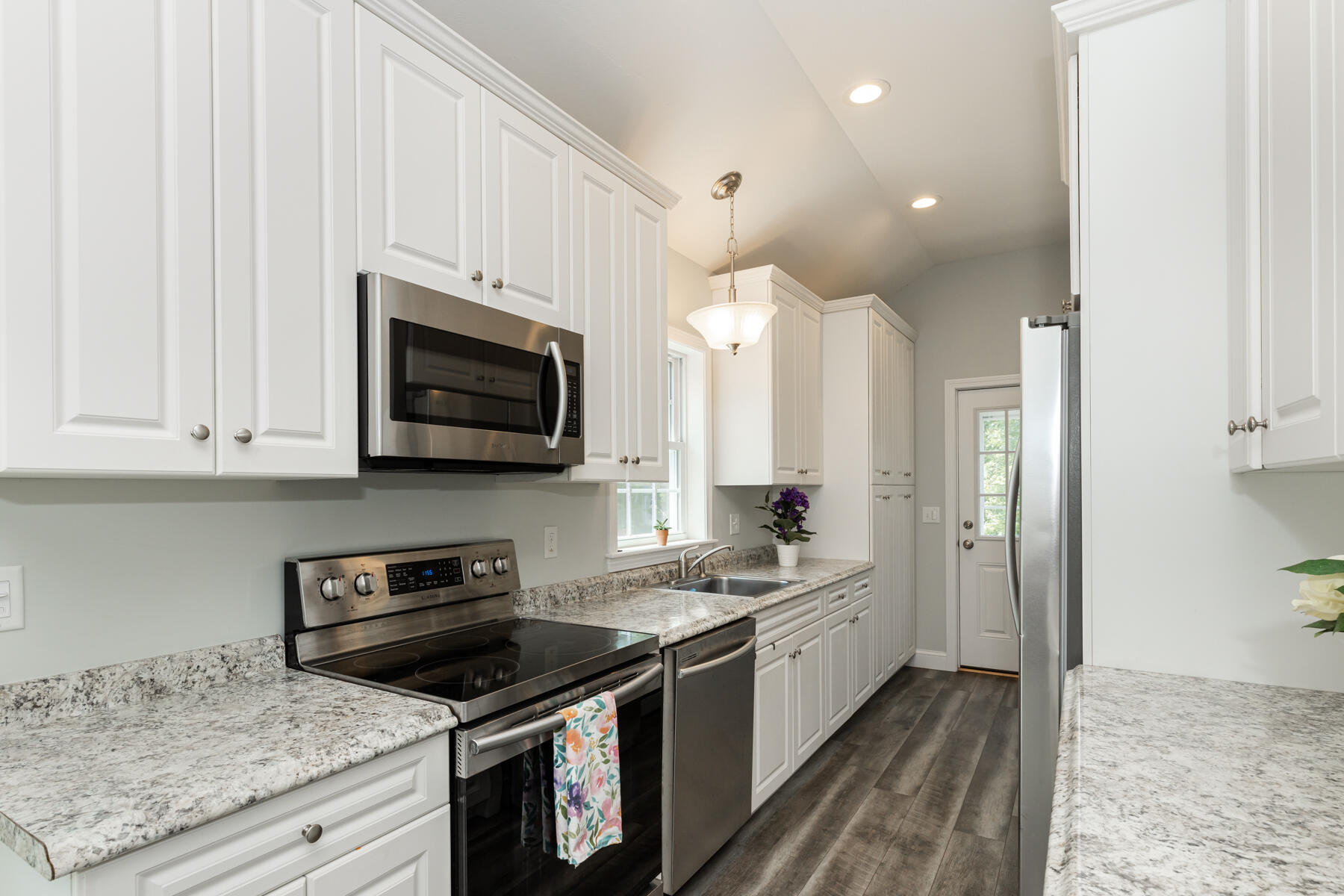 5 Whiffletree Circle Sandwich, MA 02563 - Photo 2 of 33 a kitchen with stainless steel appliances granite countertop a stove a sink and a microwave