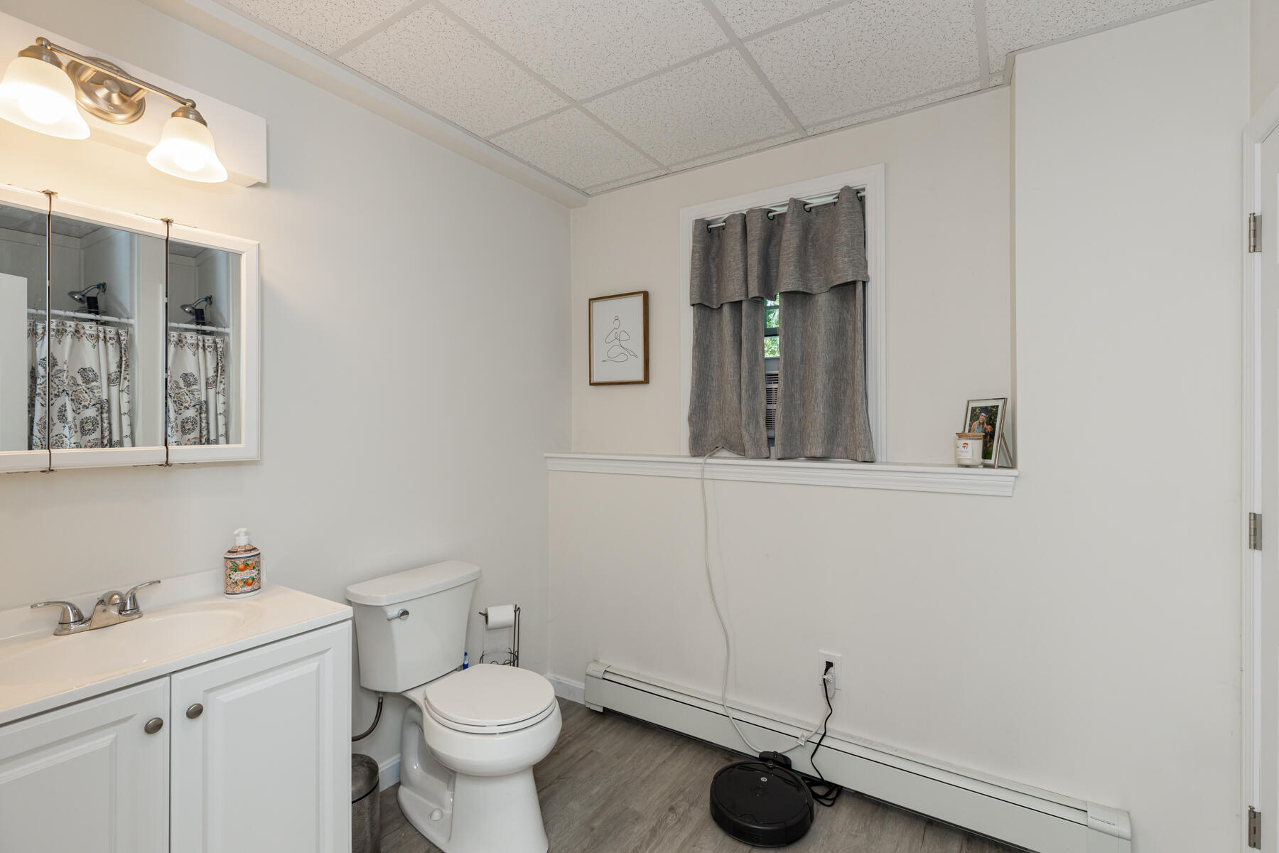 5 Whiffletree Circle Sandwich, MA 02563 - Photo 22 of 33 a bathroom with a toilet sink and mirror