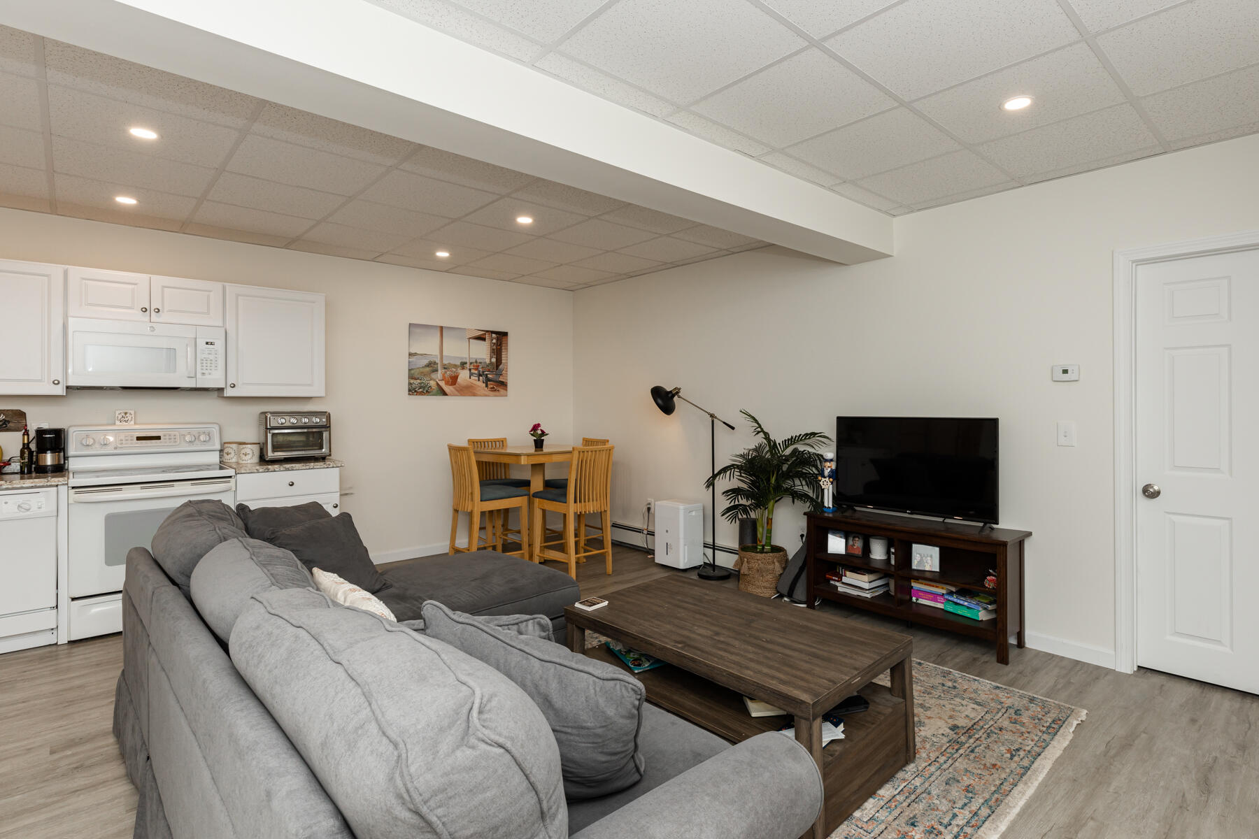 5 Whiffletree Circle Sandwich, MA 02563 - Photo 26 of 33 a living room with furniture and a flat screen tv