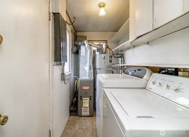 a utility room with dryer and washer