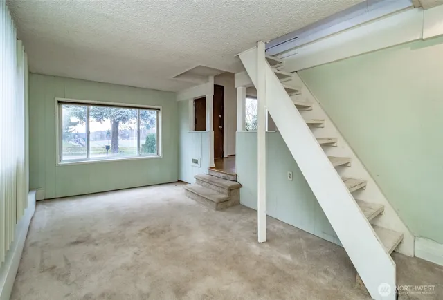 an empty room with windows