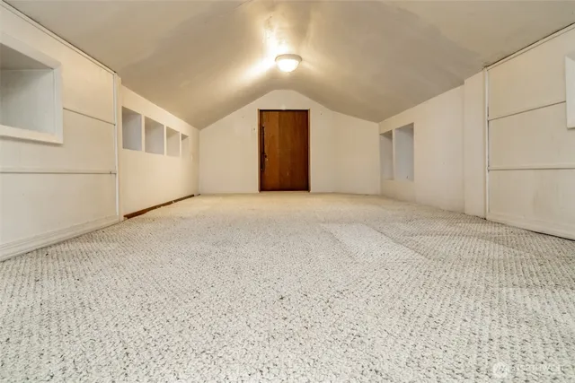 a view of a kitchen with a sink dishwasher and a microwave oven