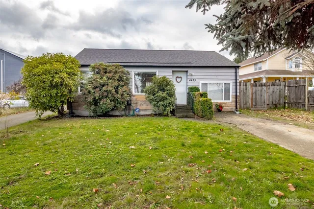 a view of a house with garden and yard
