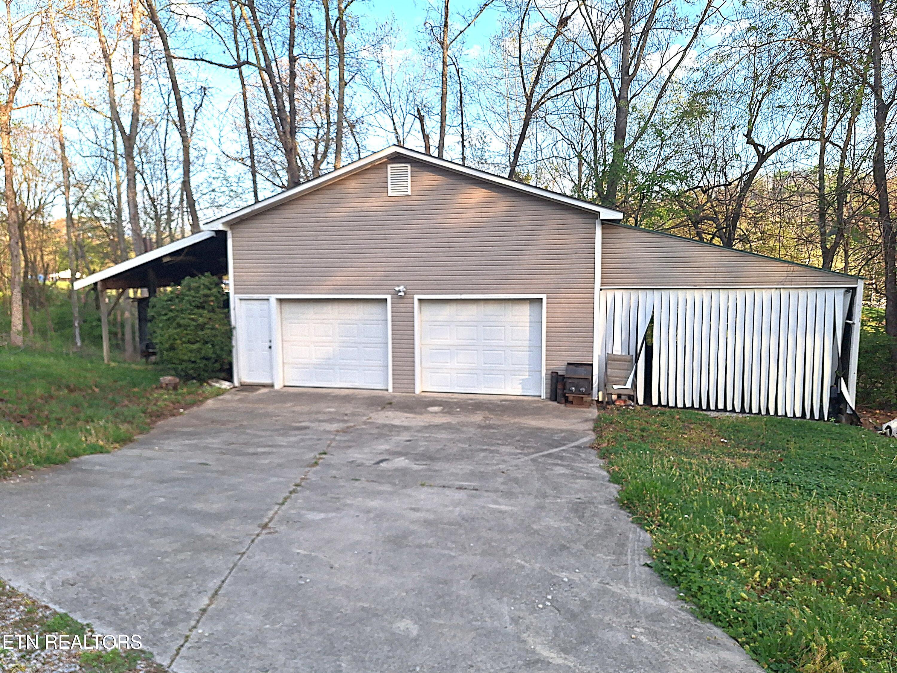 2381 Classic Way Powell, TN 37849 - Photo 18 of 32 Garage Exterior