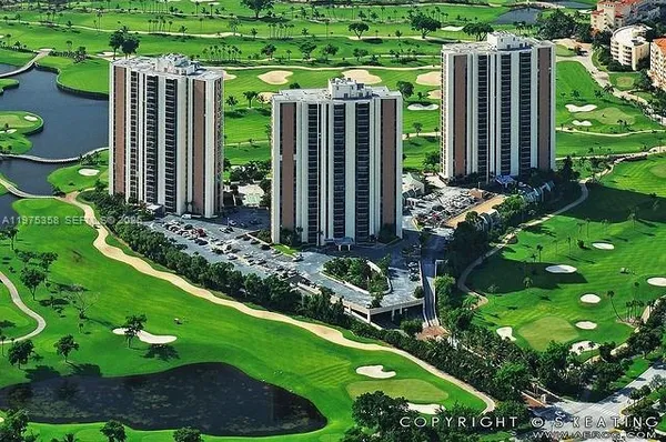 a view of a house with a backyard and garden