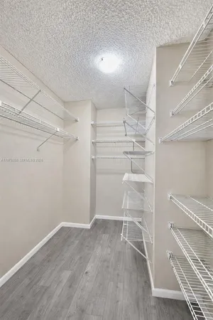 a view of an empty walk in closet