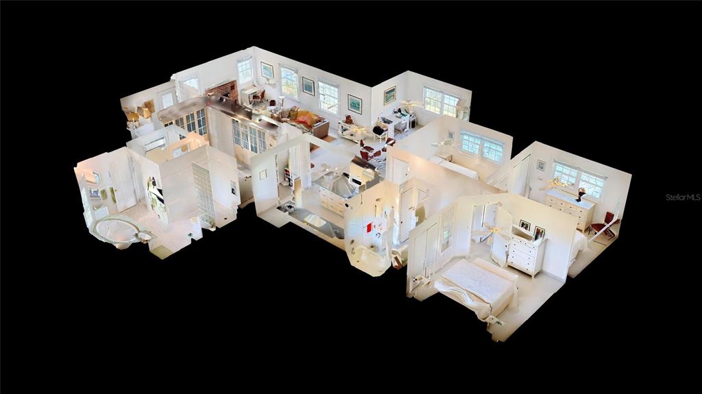 7390 South Mc Alpin Road McAlpin, FL 32062 - Photo 50 of 53 a white bed sitting in a bedroom next to a white cabinet