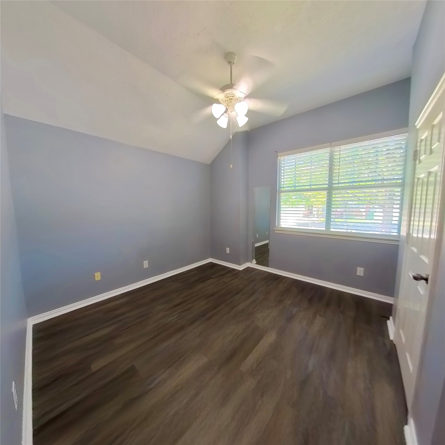 30938 Blue Ridge Park Lane Spring, TX 77386 - Photo 7 of 32 an empty room with wooden floor and windows