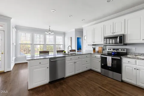 a bathroom with a sink double vanity and a bathtub