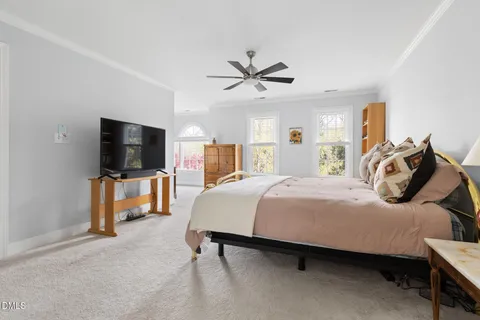 a bathroom with a double vanity sink a mirror and shower