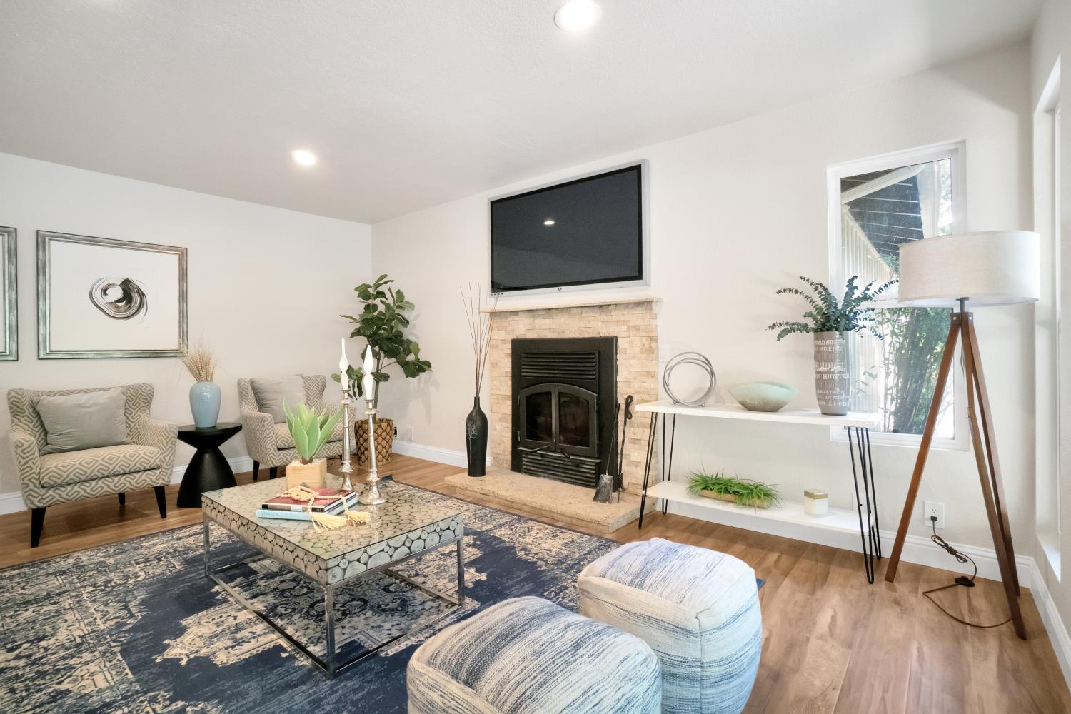 6299 Horseshoe Bar Road Loomis, CA 95650 - Photo 3 of 43 a living room with furniture and a fireplace