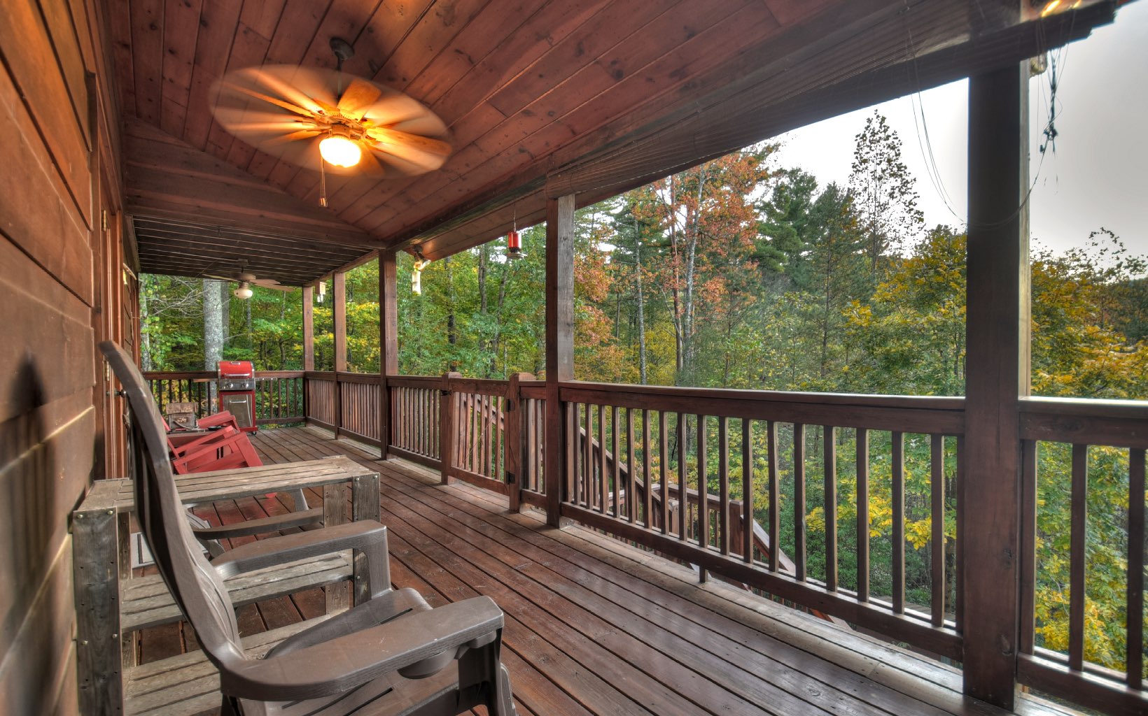 216 The Forest Road Blue Ridge, GA 30513 - Photo 19 of 41 a view of a two chairs in the balcony