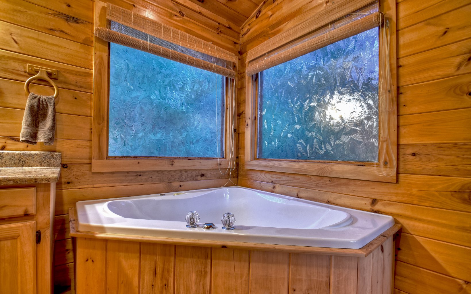 216 The Forest Road Blue Ridge, GA 30513 - Photo 35 of 41 a bathroom with a sink and a window