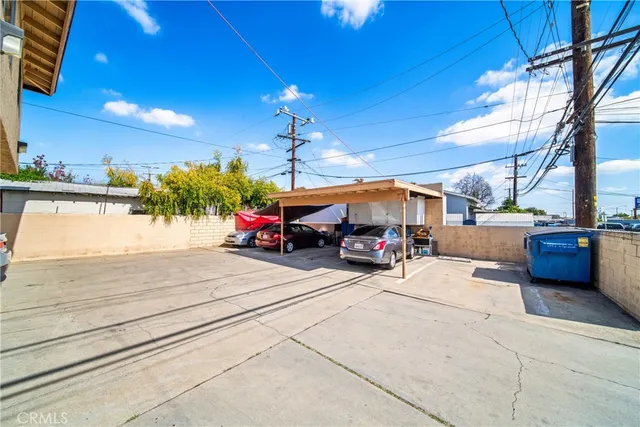 a view of a cars park in front of house