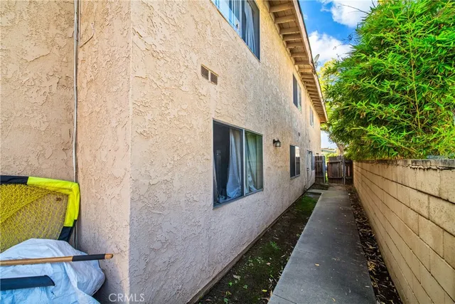 a view of a balcony with wooden floor