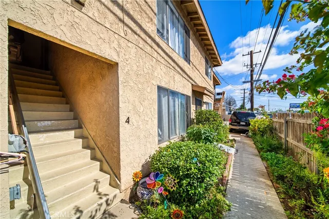 a view of a pathway with house front door