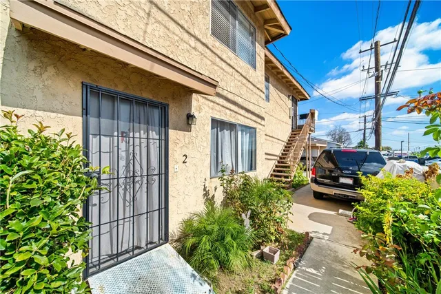 a view of a house with a garden