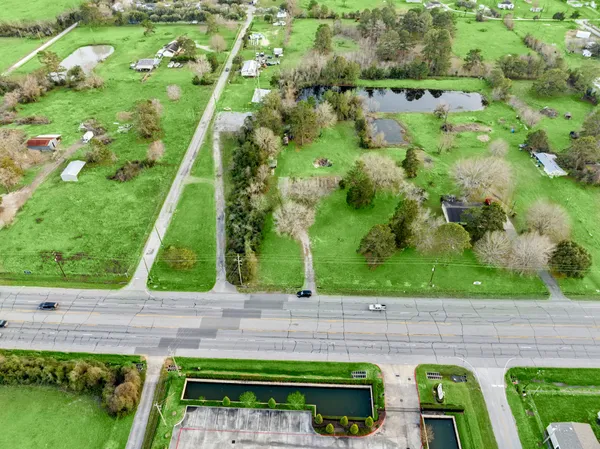 a view of backyard with green space