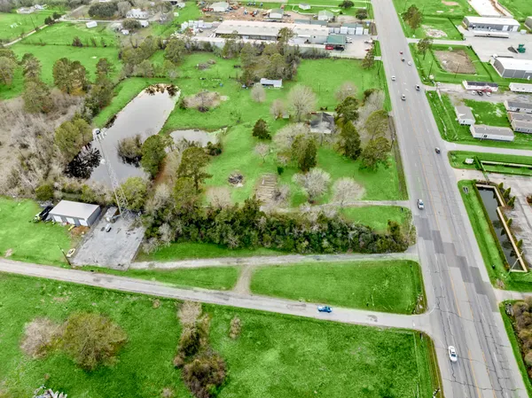 a view of a garden with a lake