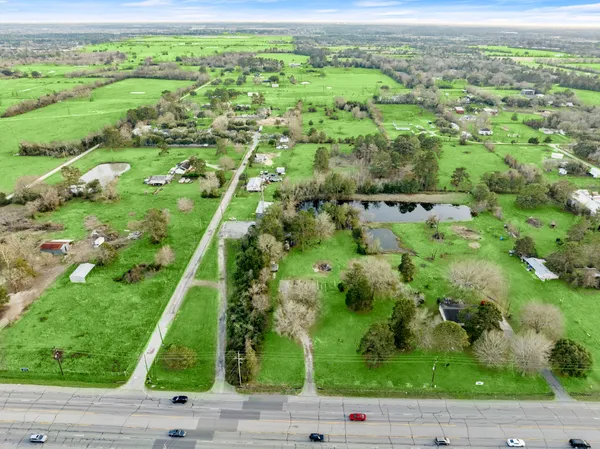 a view of a yard with an umbrella