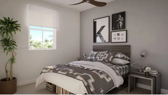 a bedroom with a bed and a table in it