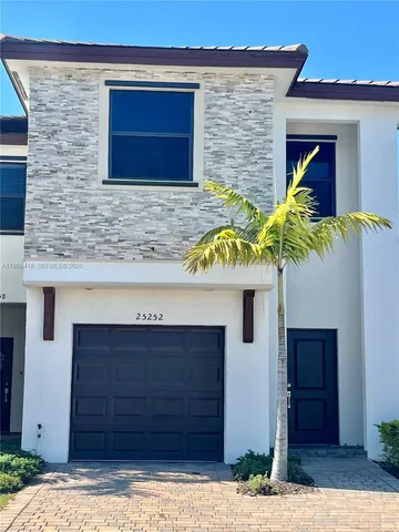 a view of entrance front of house