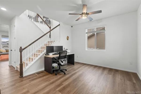 a view of entryway with wooden floor