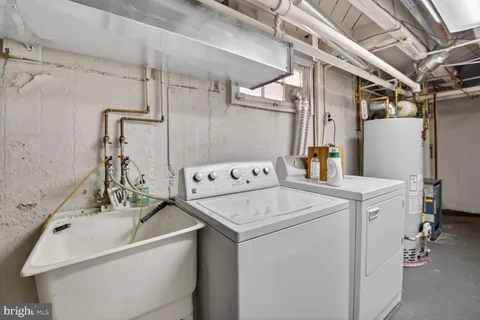 a view of an empty room with furniture