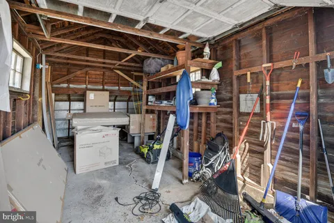 a backyard of a house with wooden fence