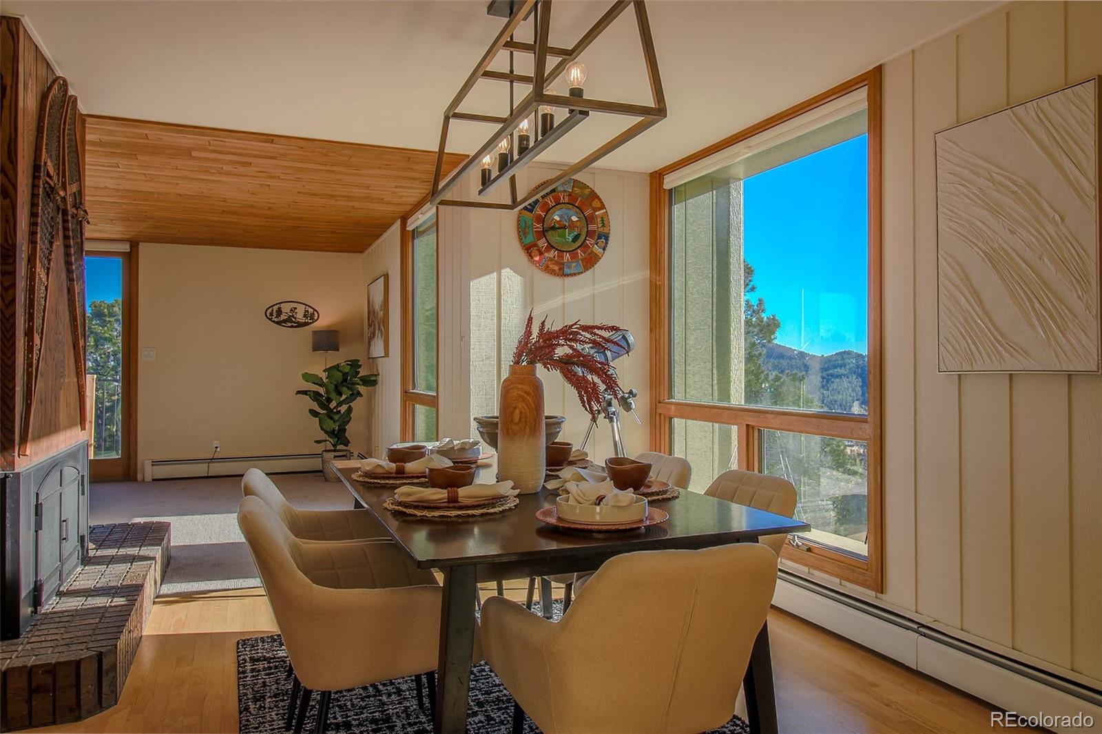243 Paradise Road Golden, CO 80401 - Photo 11 of 49 a view of a dining room with furniture window and wooden floor