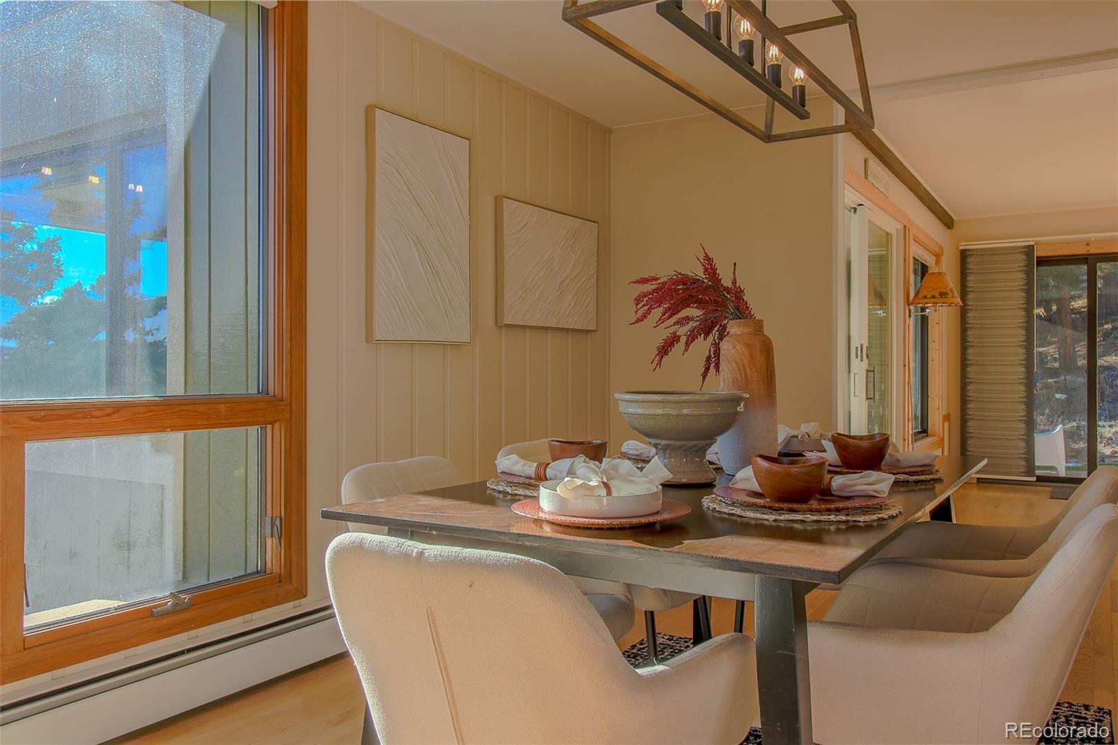 243 Paradise Road Golden, CO 80401 - Photo 12 of 49 a room with a table and chairs