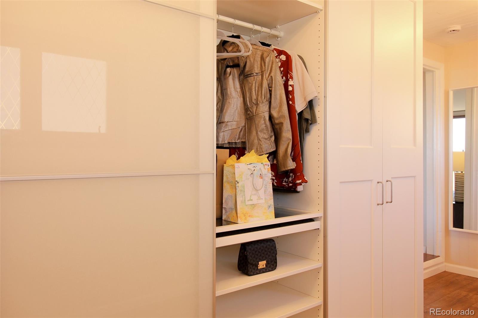 243 Paradise Road Golden, CO 80401 - Photo 23 of 49 a view of walk in closet with clothes and shoes