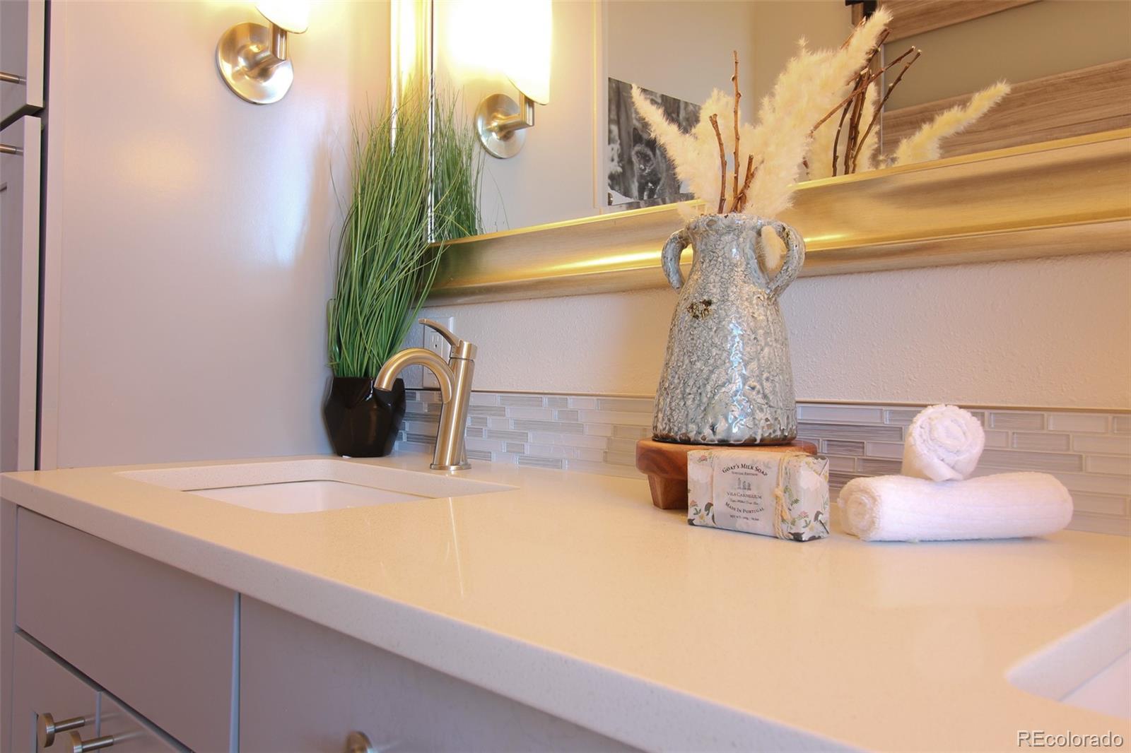 243 Paradise Road Golden, CO 80401 - Photo 31 of 49 a bathroom with a sink and a mirror