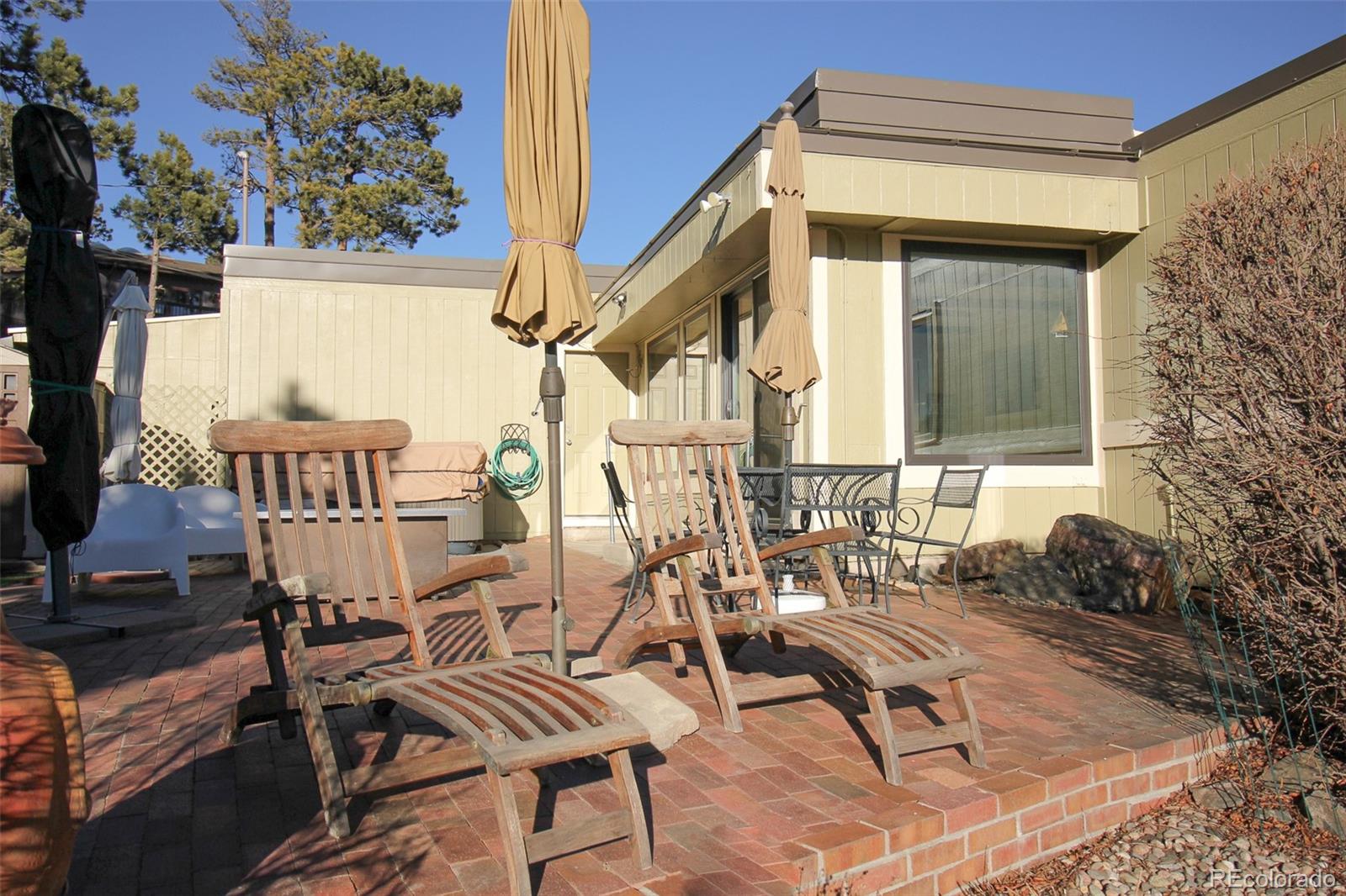 243 Paradise Road Golden, CO 80401 - Photo 40 of 49 a view of a chairs and table in the balcony