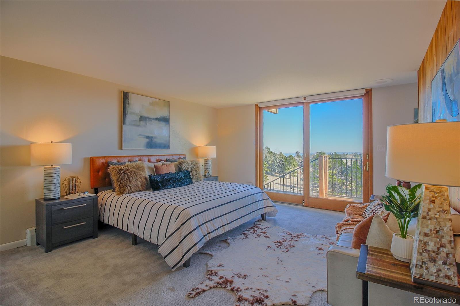 243 Paradise Road Golden, CO 80401 - Photo 4 of 49 a bedroom with a bed and a couch