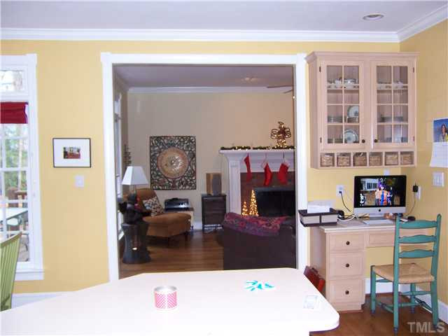View from kitchen into family room. Note builtin desk with cubbies! Kitchen