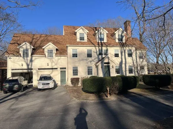 a car parked in front of a house