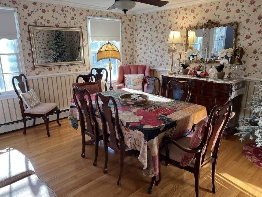 30 Katharine Lee Bates Road Falmouth, MA 02540 - Photo 3 of 15 a view of a dining room with furniture and chandelier