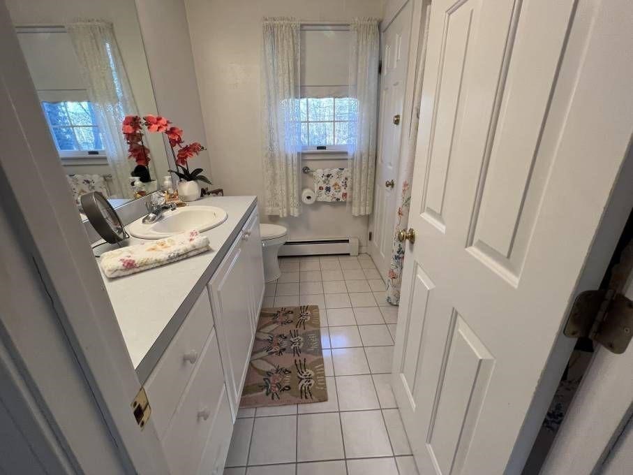 30 Katharine Lee Bates Road Falmouth, MA 02540 - Photo 9 of 15 a hallway with washer and dryer