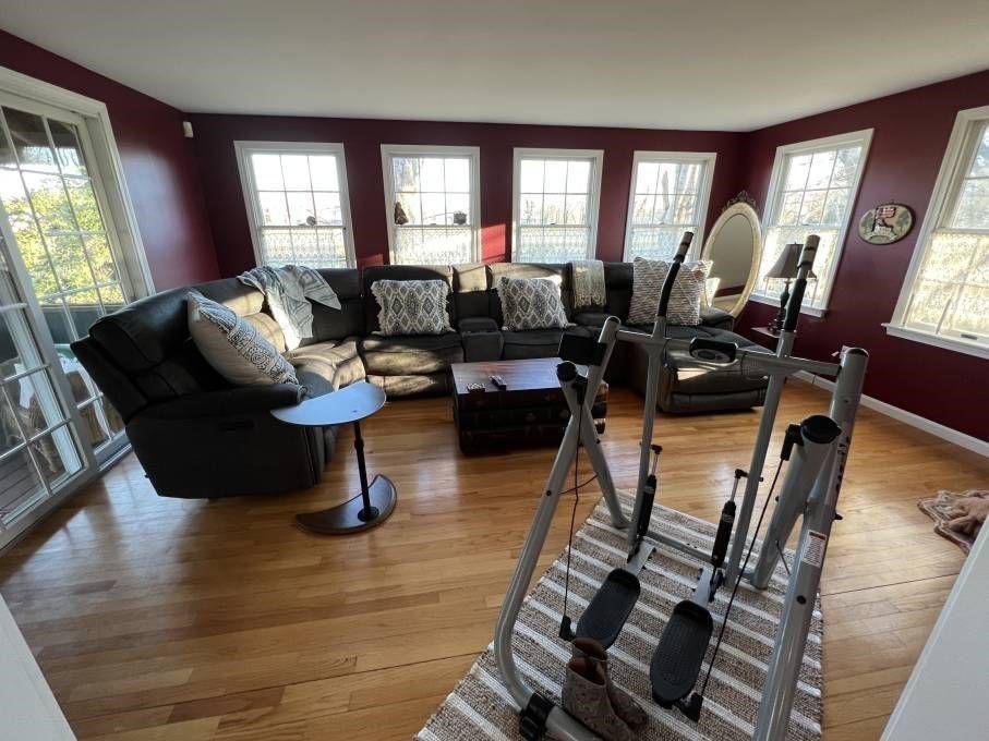 30 Katharine Lee Bates Road Falmouth, MA 02540 - Photo 10 of 15 a living room with furniture or window and a wooden floor