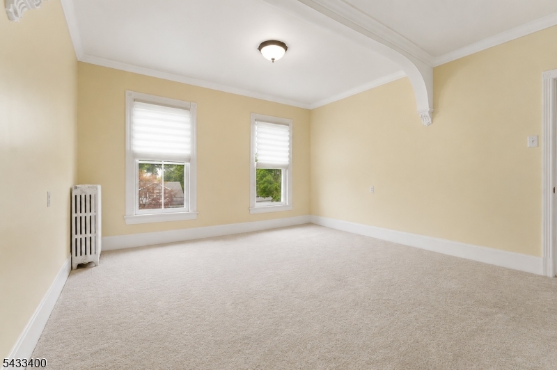 61 New Street Hampton, NJ 08827 - Photo 32 of 45 a view of a big room with windows and chandelier fan