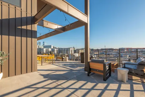 a view of balcony with outdoor seating