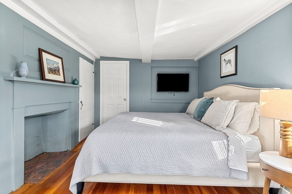 161 High Road Newbury, MA 01951 - Photo 21 of 39 a bedroom with a bed and a flat screen tv