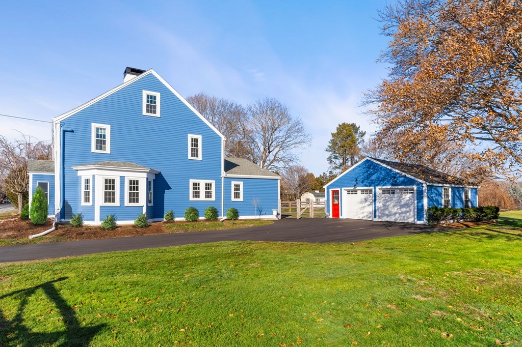 161 High Road Newbury, MA 01951 - Photo 38 of 39 a front view of a house with a yard